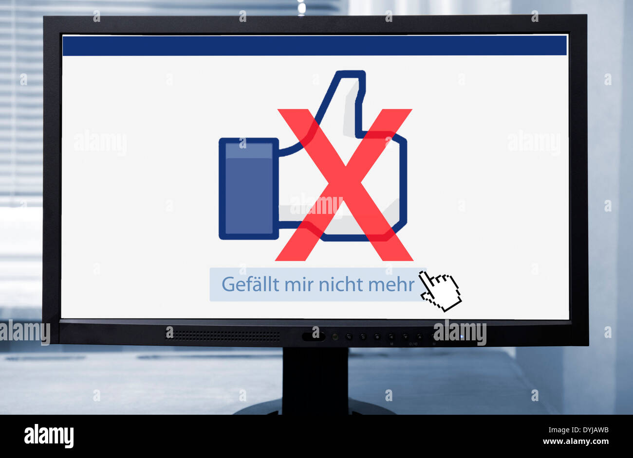 CROSSED OUT Like-thumb on computer monitor, the abolition of the Facebook thumb Stock Photo