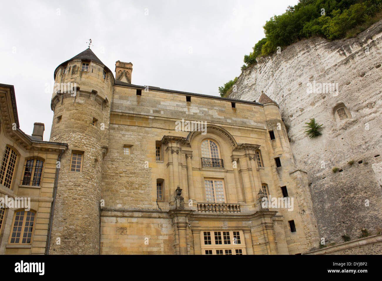 Chateau de la roche-guyon stables.  The castle is dug out of the limestone cliffs. Stock Photo