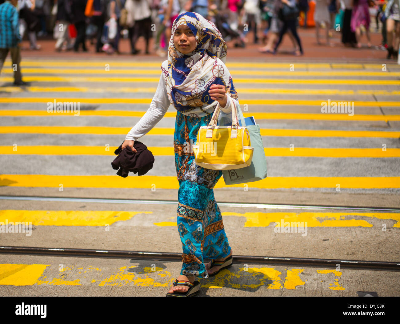 Indonesian in traditional dress in Causeway Bay, Hong Kong Stock Photo Alamy