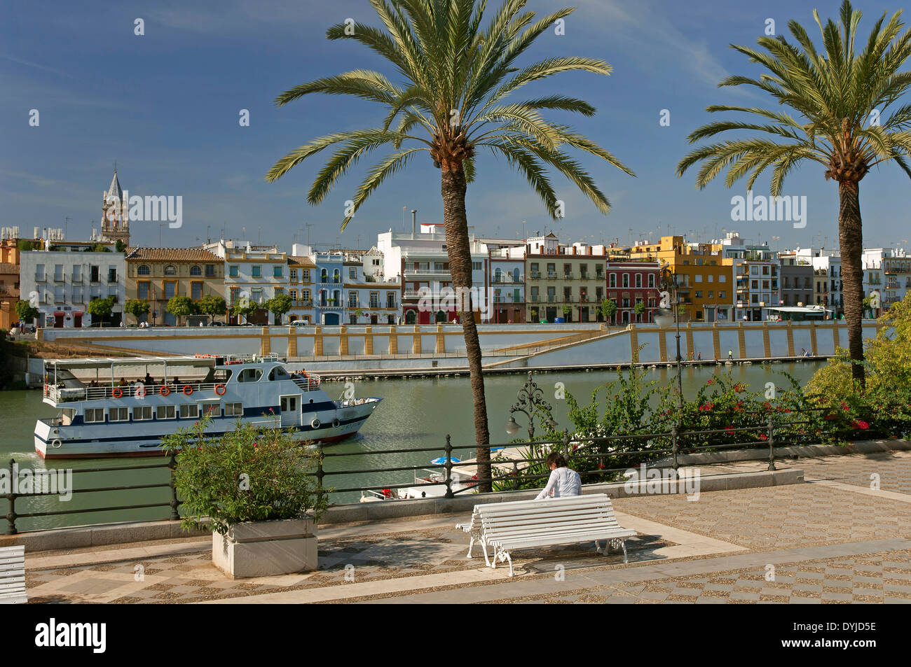 Sightseeing cruise on the river Guadalquivir and Triana district, Seville, Region of Andalusia, Spain, Europe Stock Photo