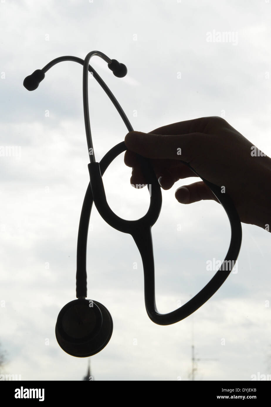 A nurse holds up a stethoscope at the hospital st josefskrankenhaus in