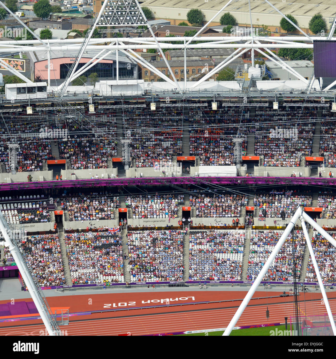 Spectators seated in athletics stadium London 2012 Olympic park from ArcelorMittal Orbit Tower observation platform during the Paralympic Games UK Stock Photo