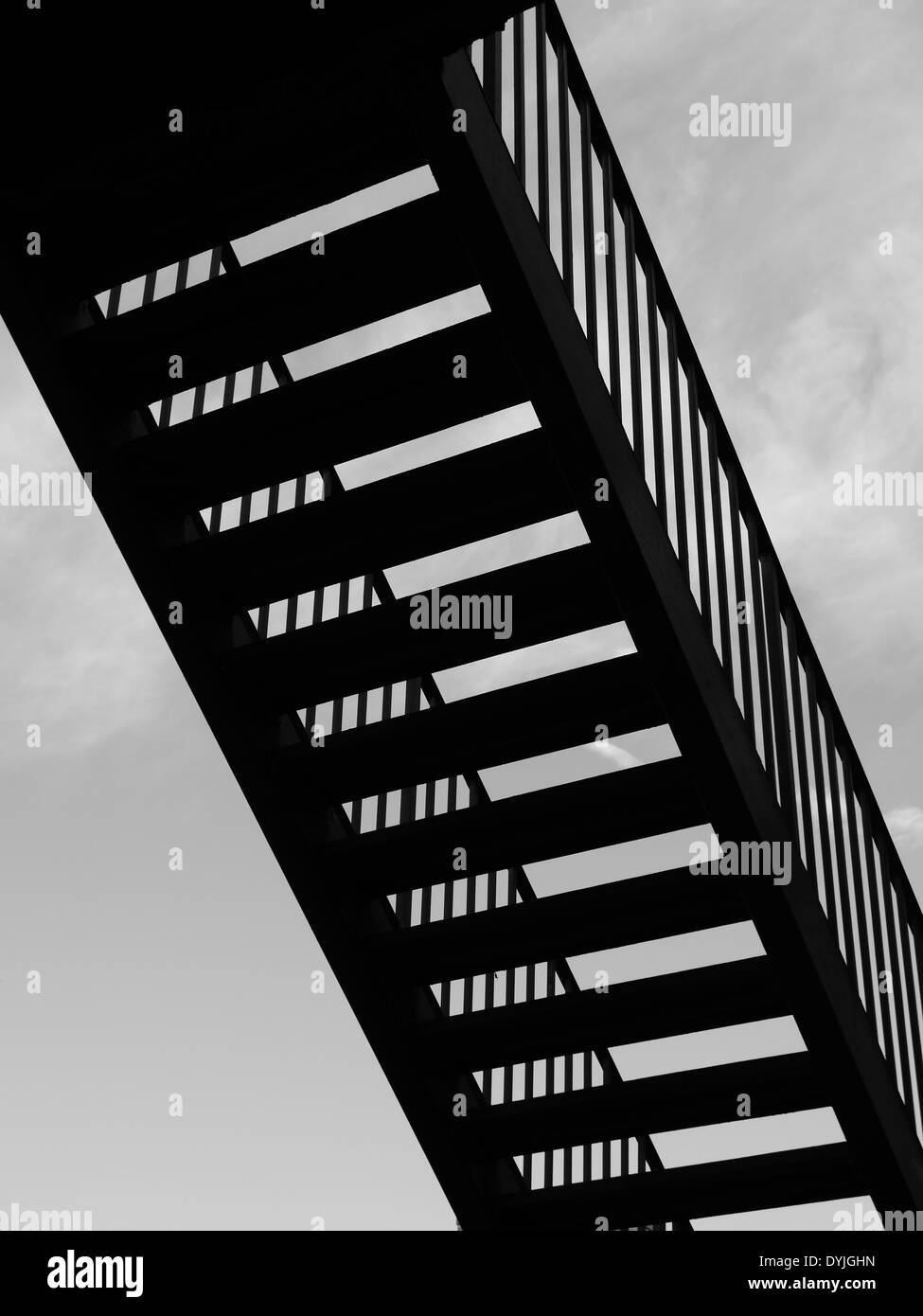 Abstract image of metal staircase in silhouette - art / creative style Stock Photo