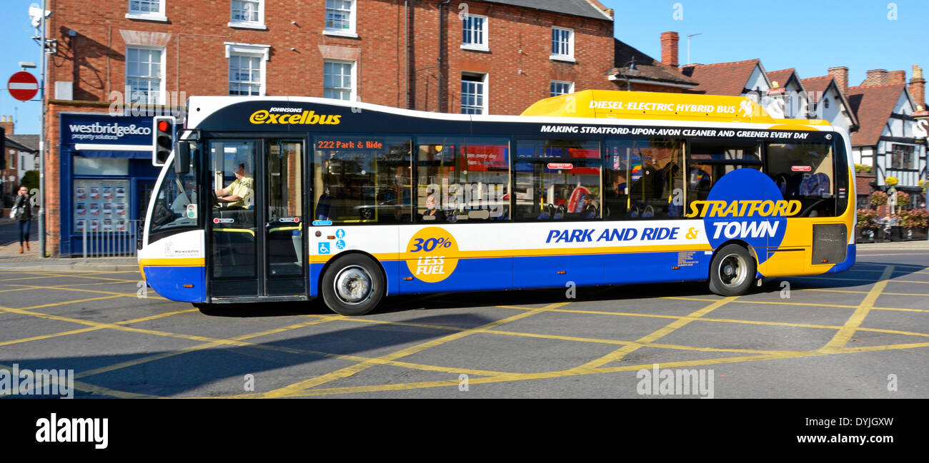 Stratford upon Avon park and ride Diesel Electric Hybrid bus service crossing box junction Stock Photo