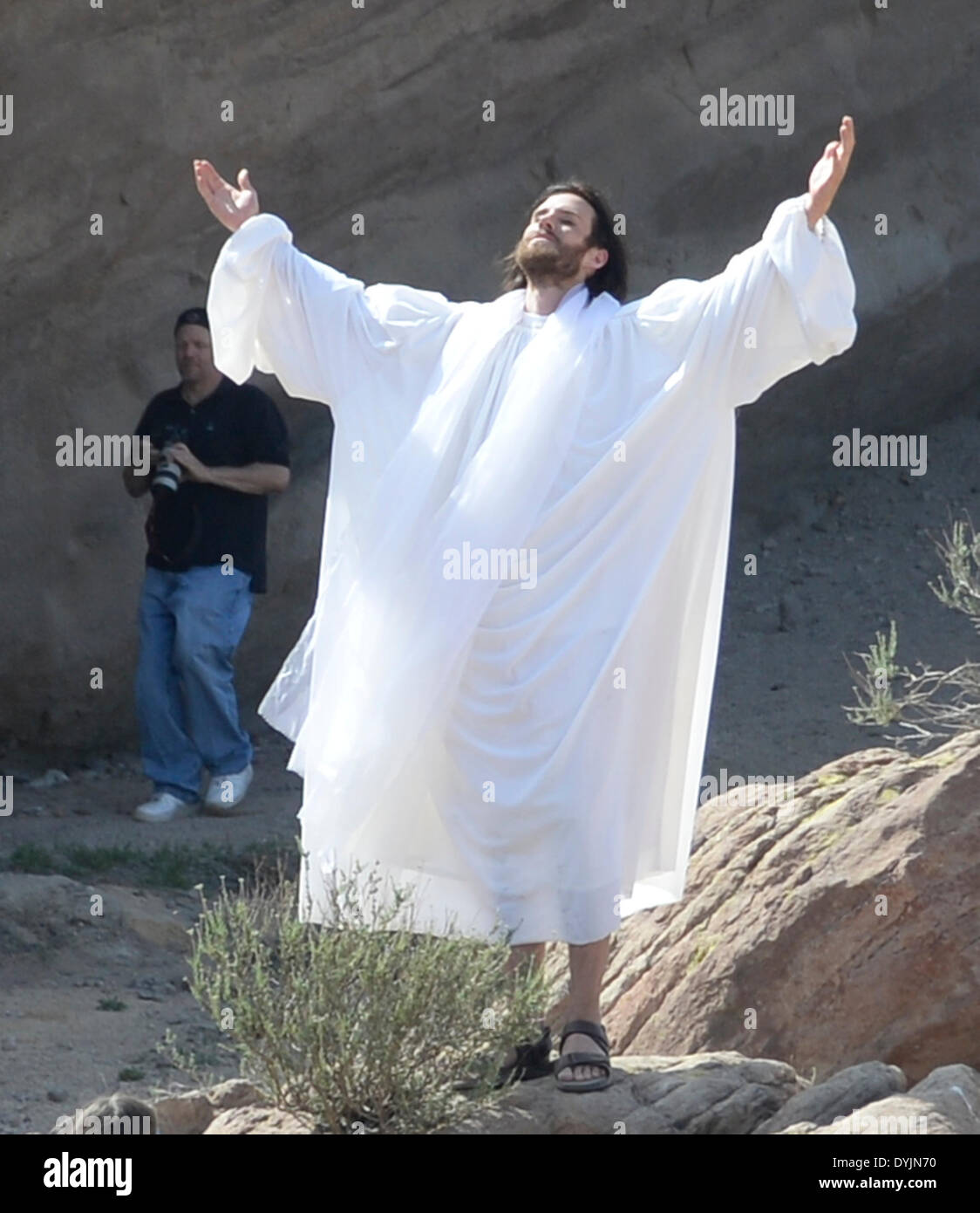 April 19, 2014, Aqua Dulce Ca. Actor Jonathan Moore plays Jesus Christ gets photo bomb by