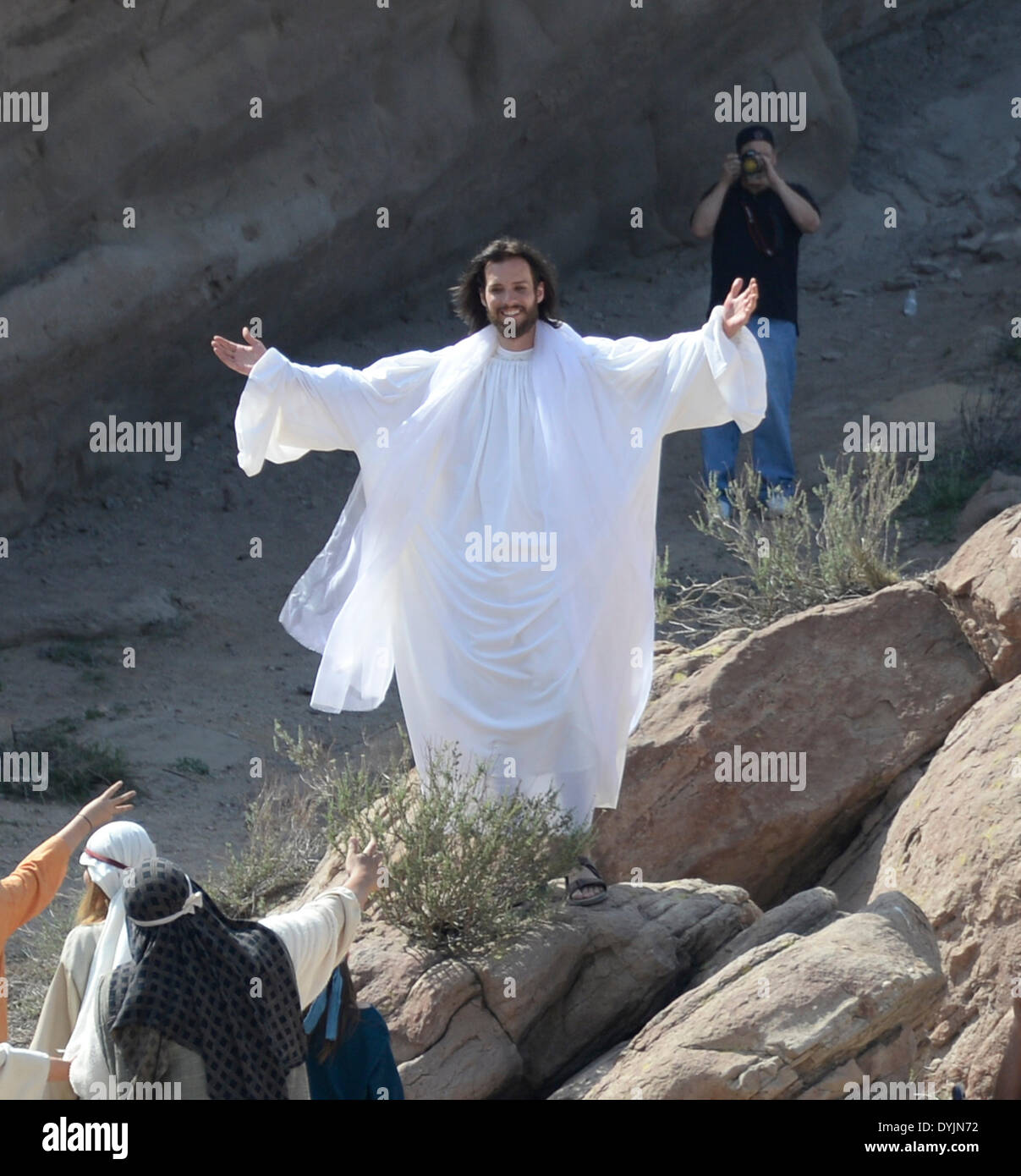April 19, 2014, Aqua Dulce Ca. Actor Jonathan Moore plays Jesus Christ gets photo bomb by