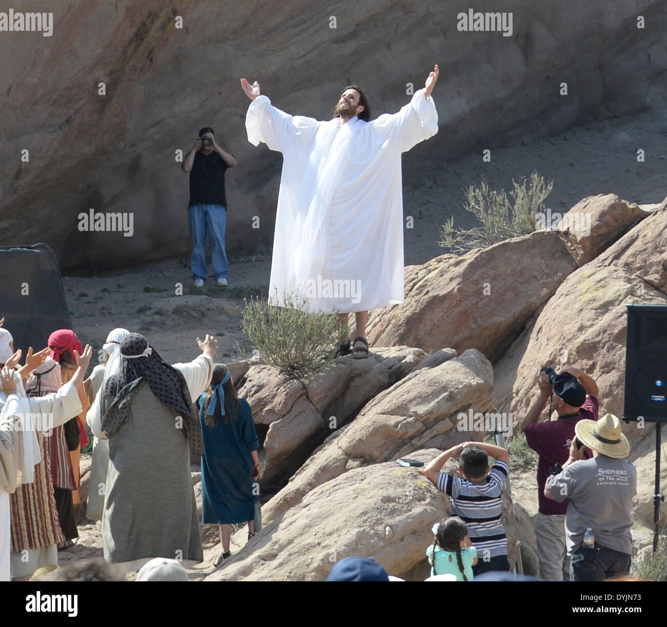 April 19, 2014, Aqua Dulce Ca. Actor Jonathan Moore plays Jesus Christ gets photo bomb by