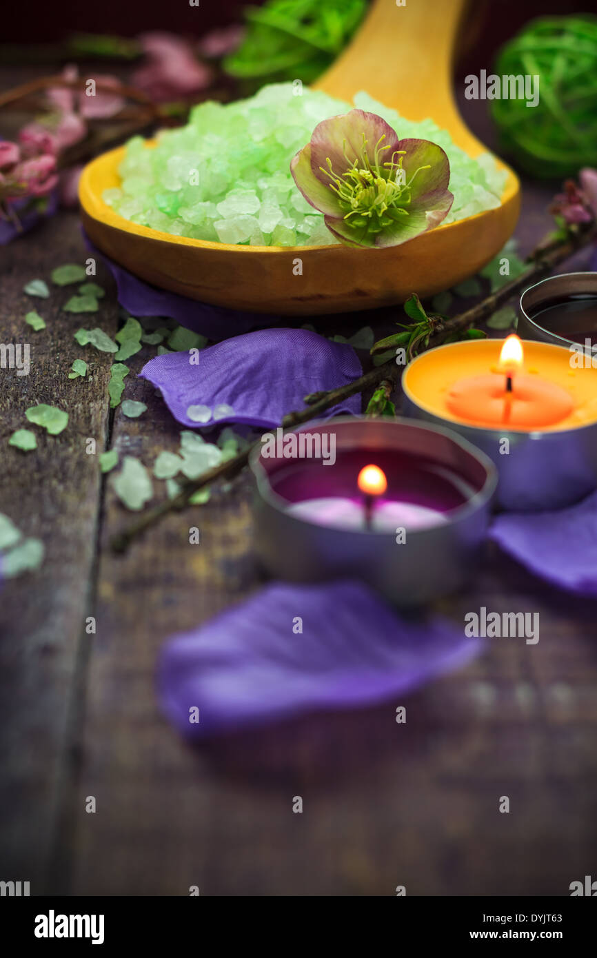 Spa setting with salt bath and aromatic candles Stock Photo Alamy