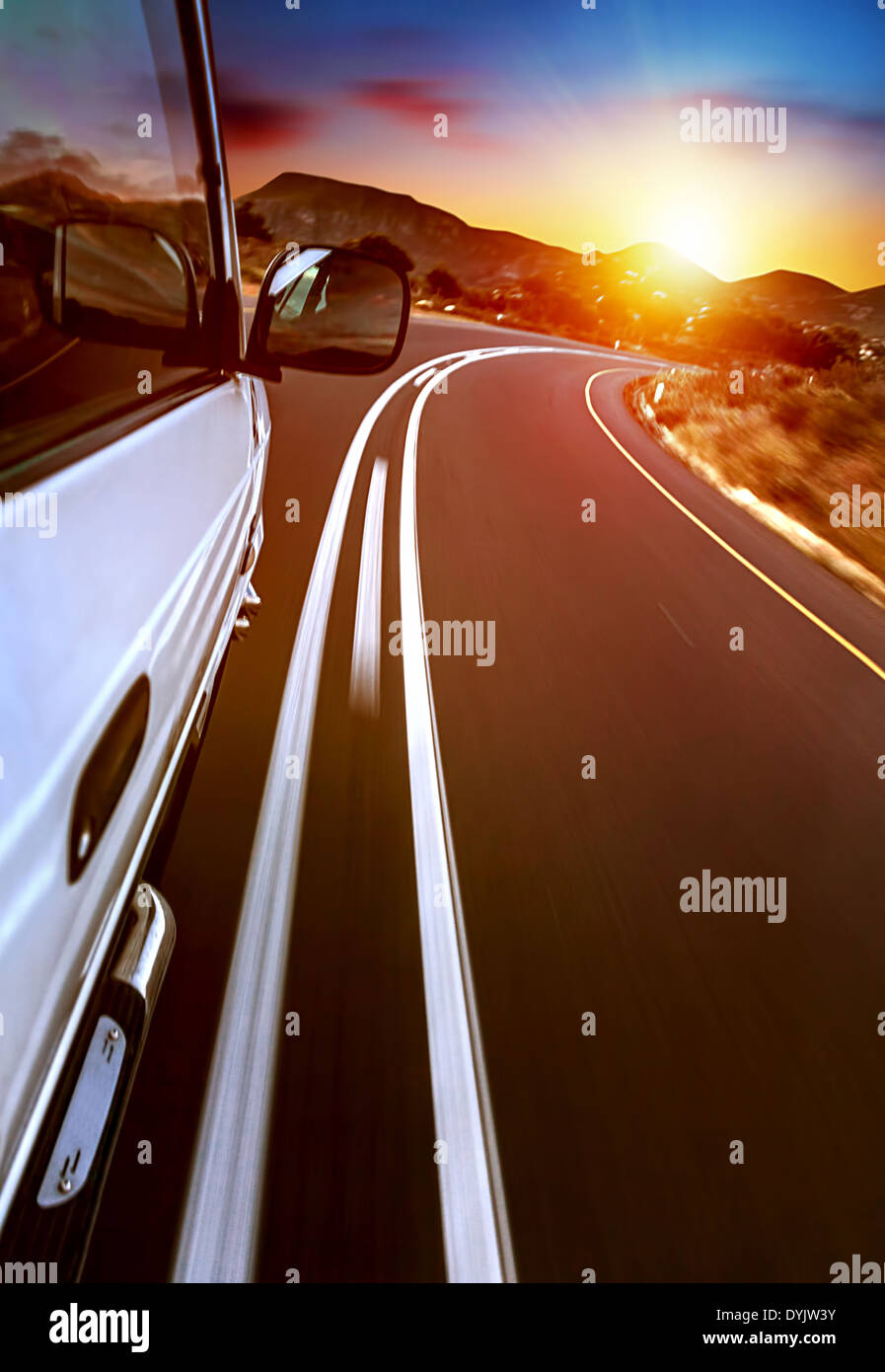 Road trip, car on the highway, road trip on sunset, journey and freedom travel, slow motion photo Stock Photo