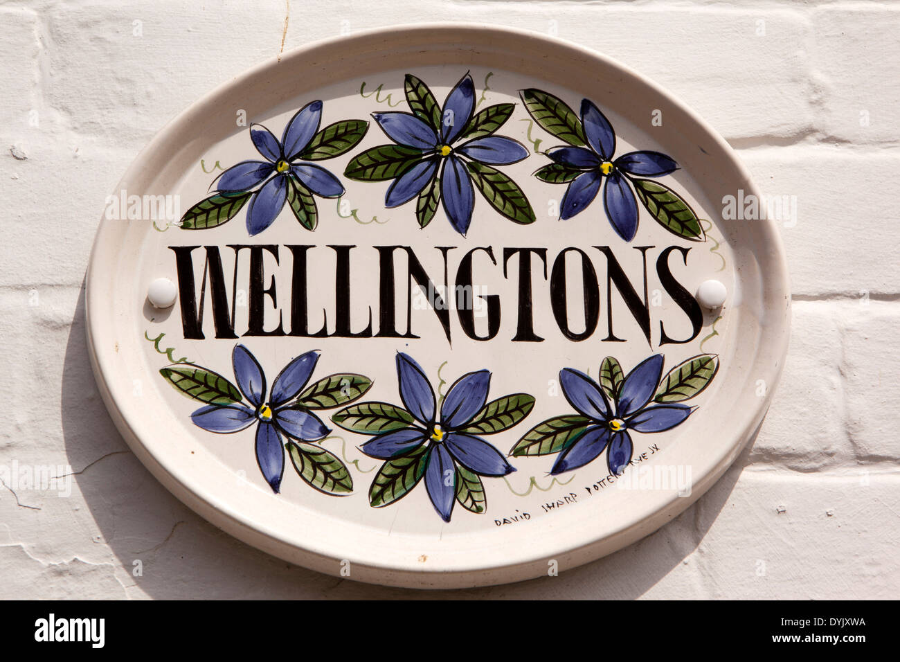 UK, England, East Sussex, Rye, The Mint, Wellingtons, ceramic house sign by David Sharp Stock