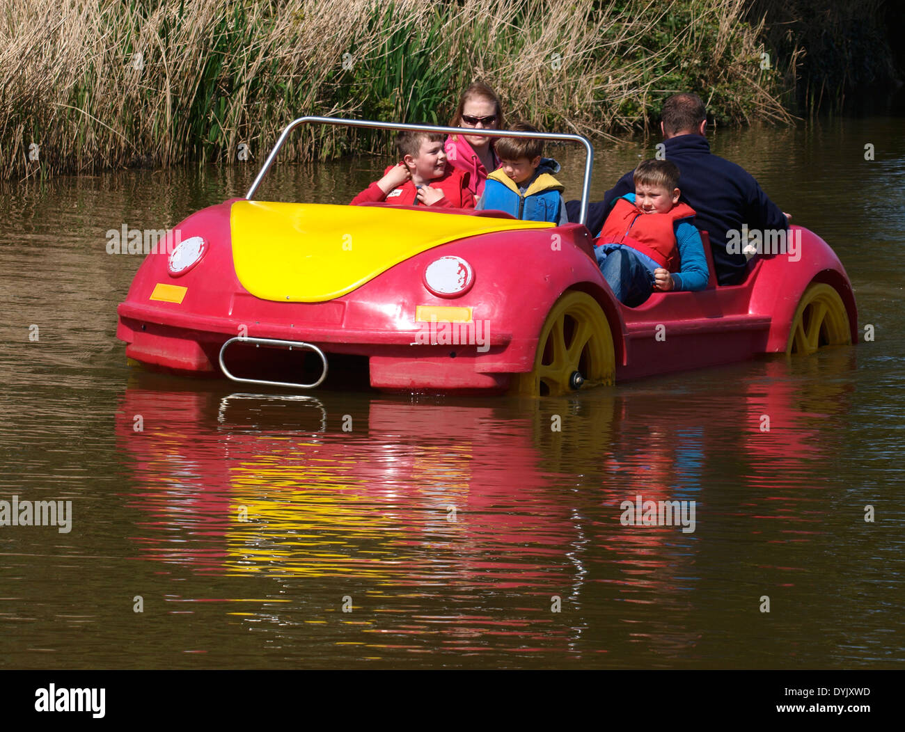 VW beetle car shaped paddle boat, Bude canal, Cornwall, UK Stock Photo
