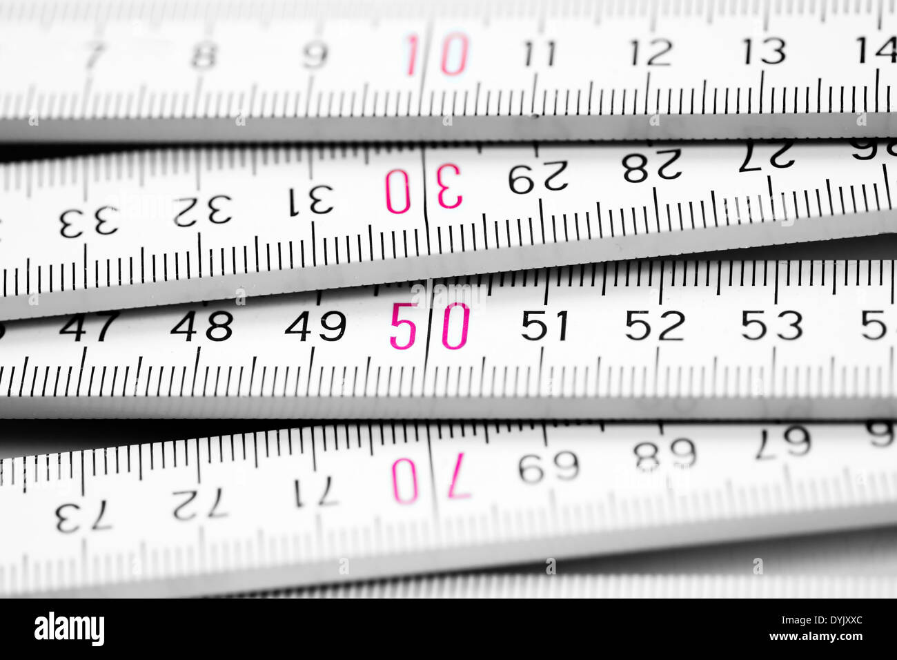 folding meter rule - measure twice, cut once Stock Photo