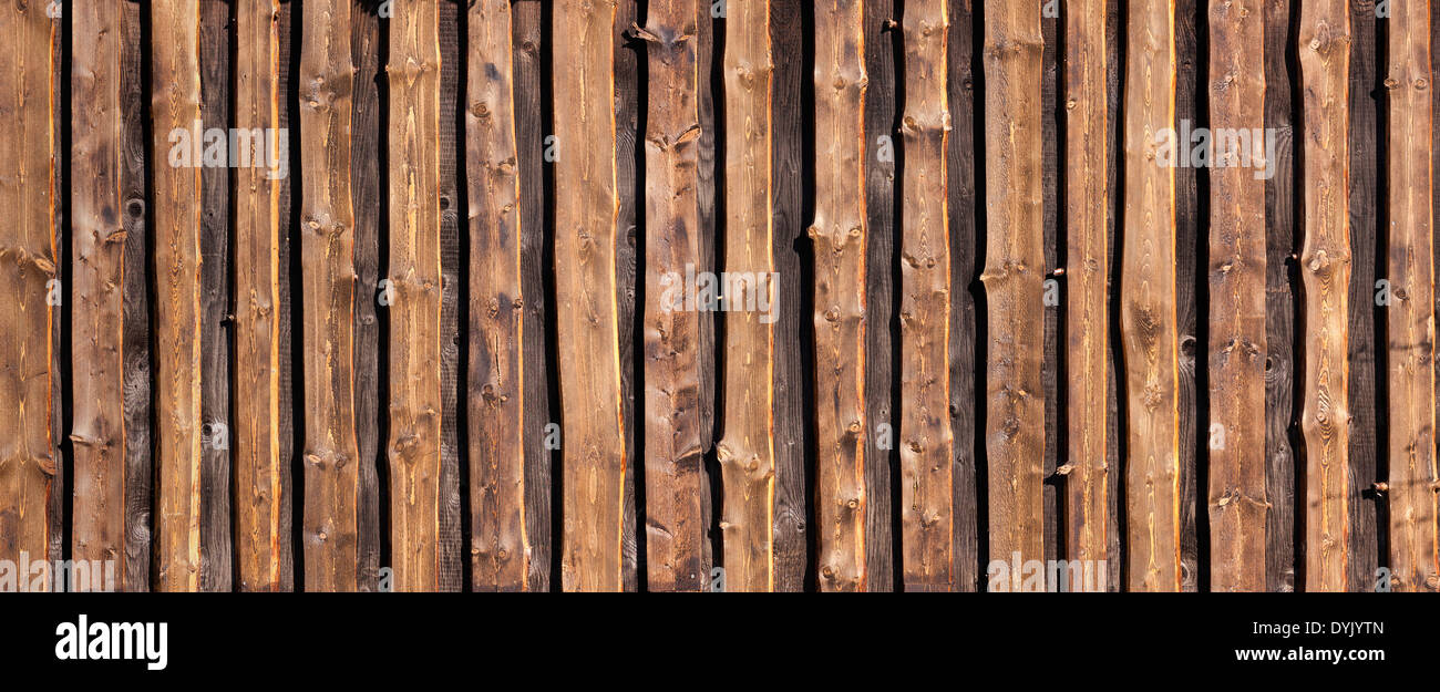 Abstract brown wood or timber board background of rough planks Stock Photo
