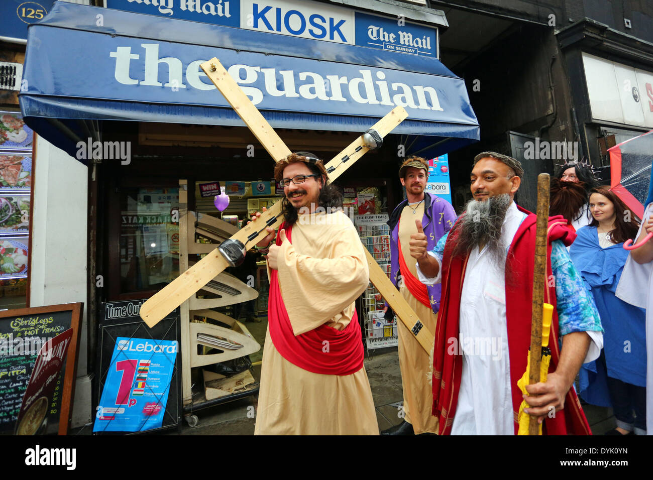 London, UK. 20th April 2014. Participants dressed as Jesus Christ in the annual Easter Sunday Christathon 2014 pub crawl, London, England. The pub crawl moves between London pubs with names associated with biblical themes or characters and started at the Trinity Pub near London Bridge, moving on to the St Christopher Inn before heading into Central London. Credit:  Paul Brown/Alamy Live News Stock Photo