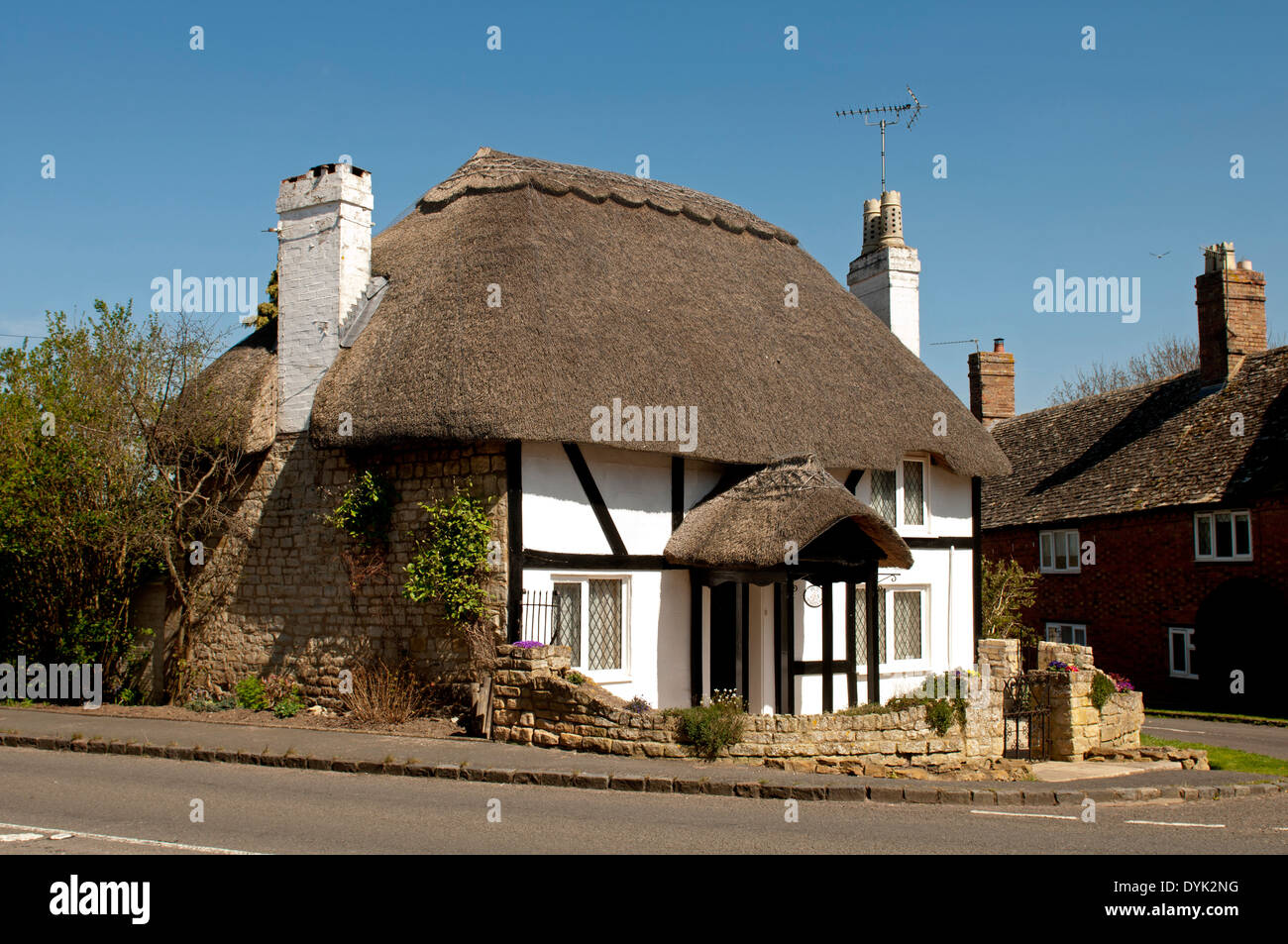 Small thatched cottage in Tredington village, Warwickshire, England, UK