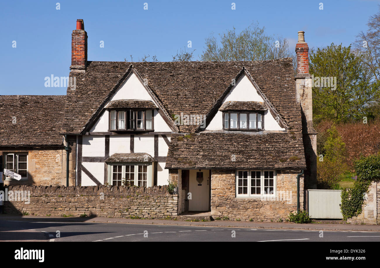 Lacock village, Wiltshire, UK. Traditional cottages. sunny day, blue sky Stock Photo