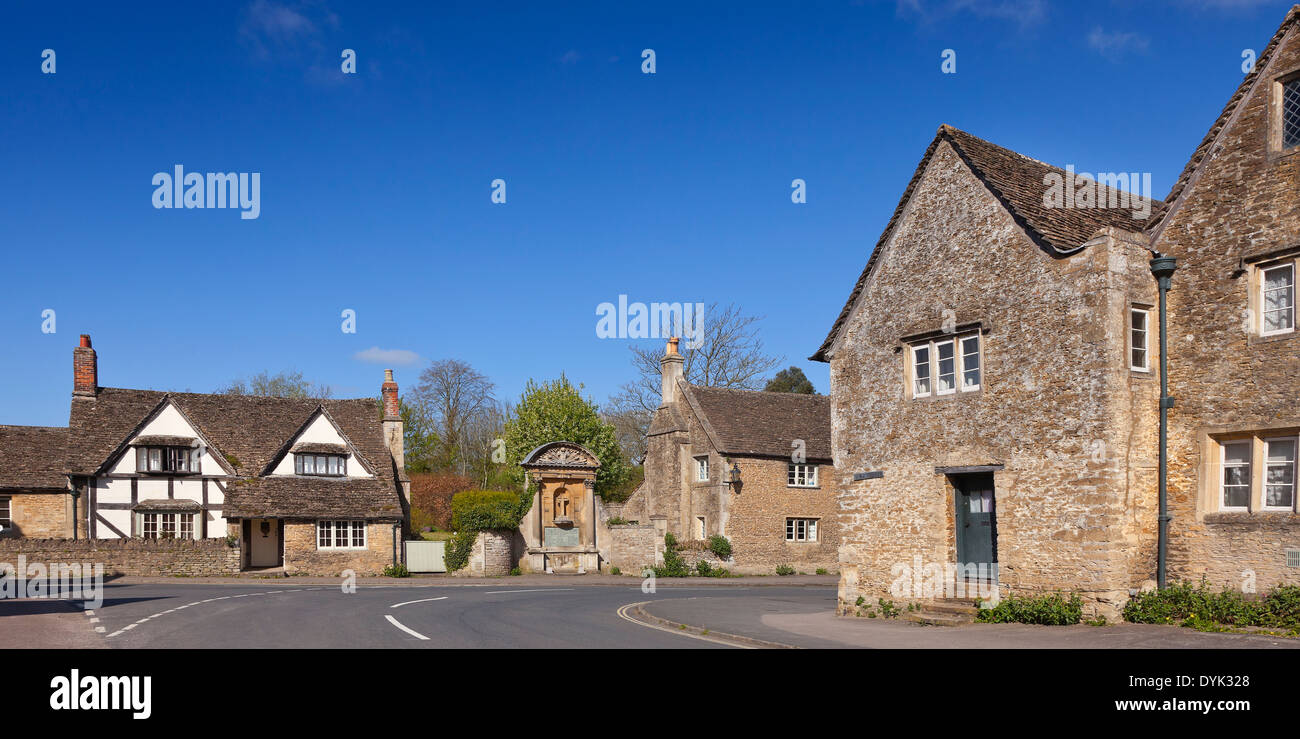 Lacock village, Wiltshire, UK. Traditional cottages. sunny day, blue sky Stock Photo