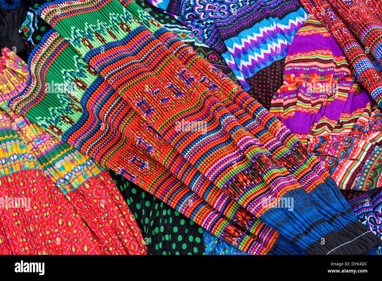 Flower Hmong pleated skirts for sale in market, Sapa (Sa Pa), North Vietnam Stock Photo