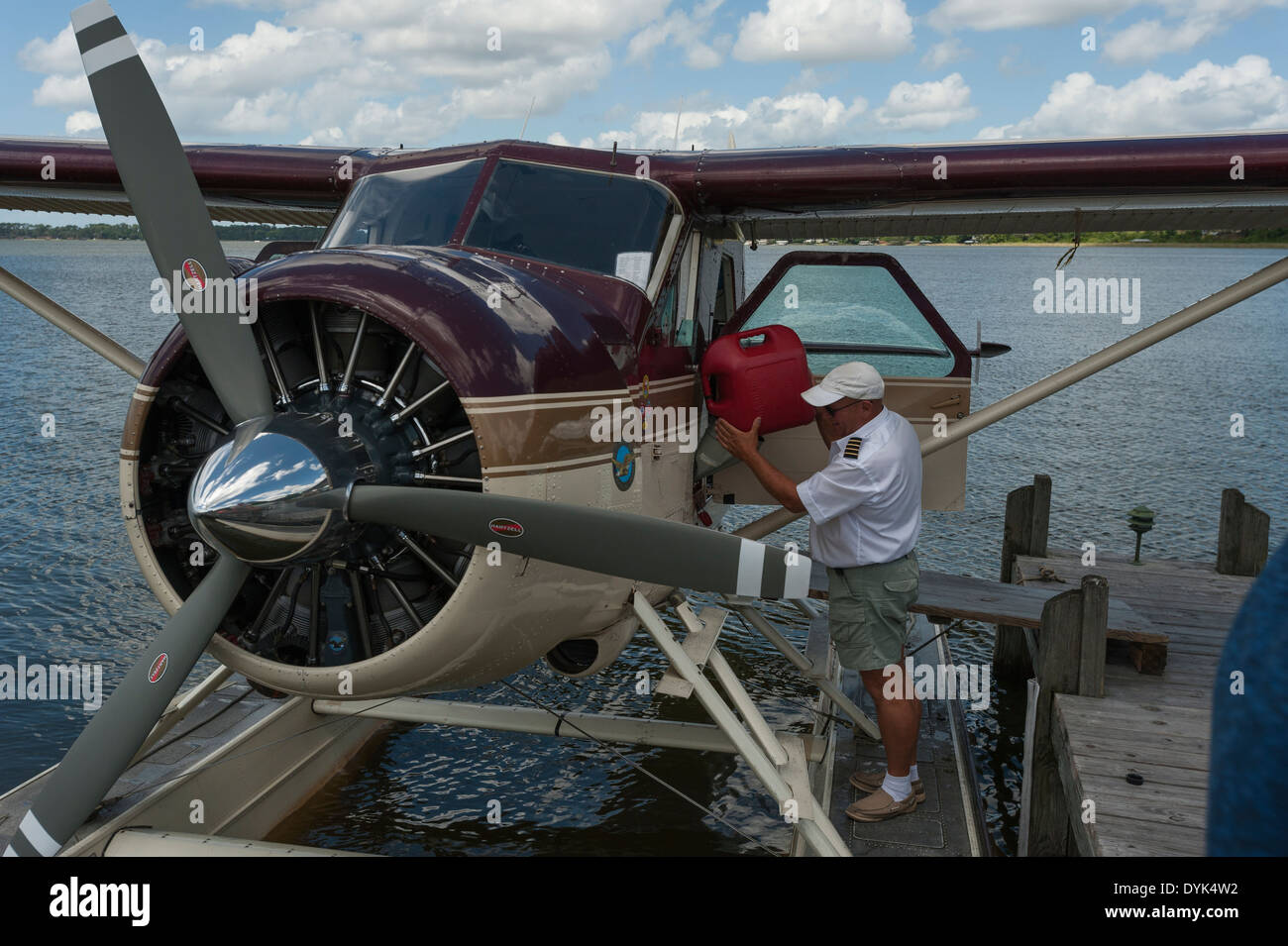 Seaplane refueling after giving air rides to tourist on Lake Dora ...