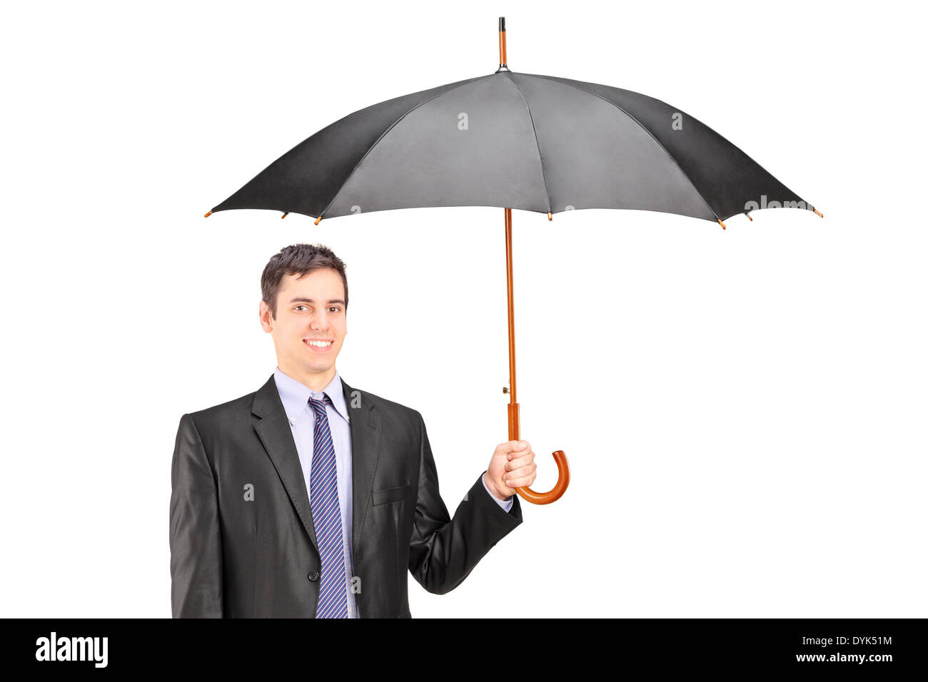 Man holding an umbrella Stock Photo - Alamy