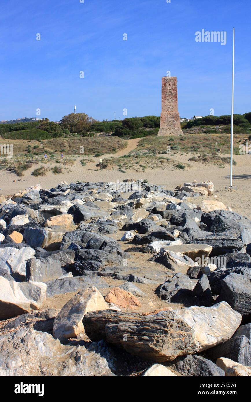Torre De Los Ladrones at Cobopino beach on the costa del sol in Spain Stock Photo