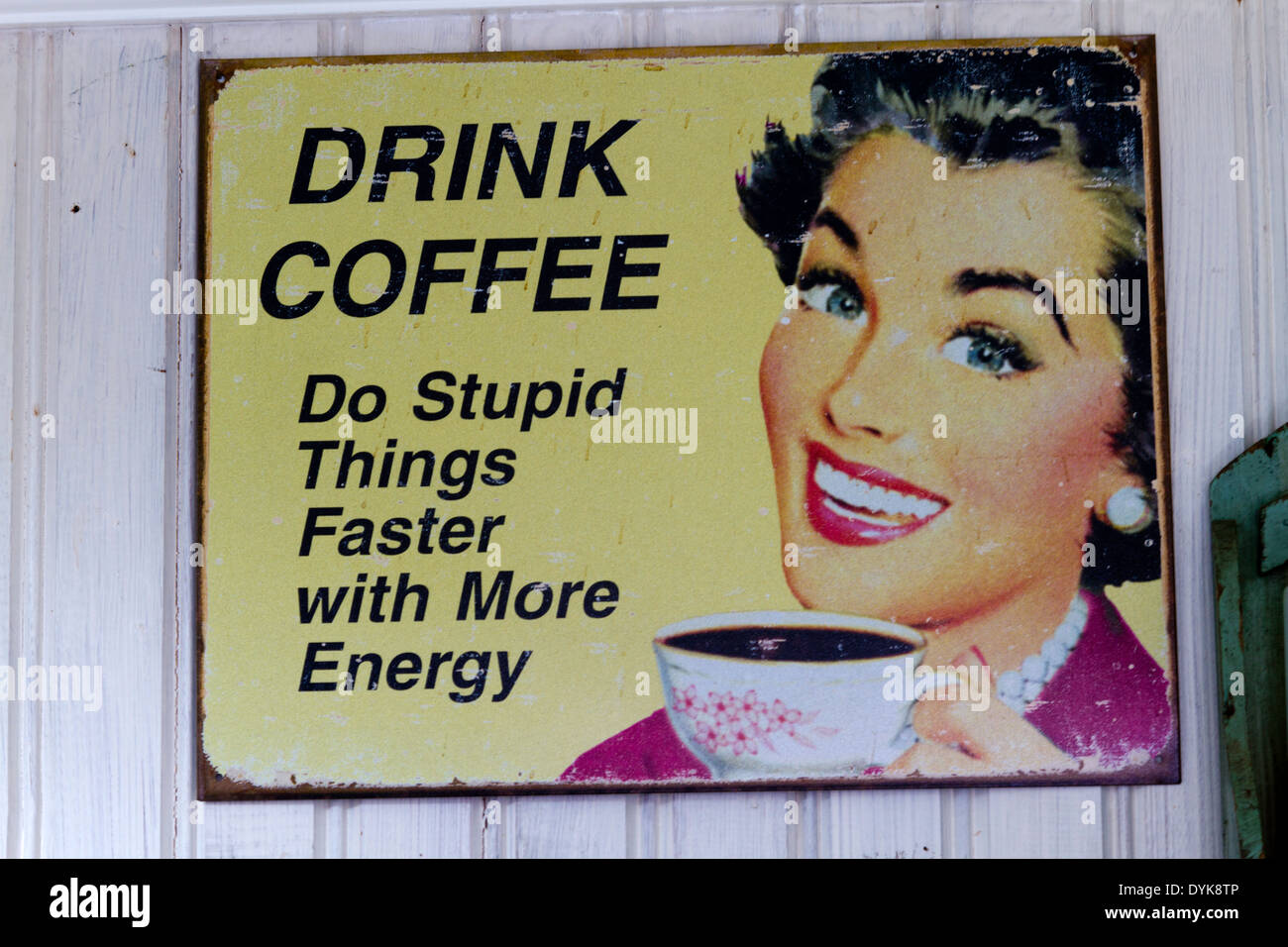 Humorous vintage sign in coffee shop. Stock Photo