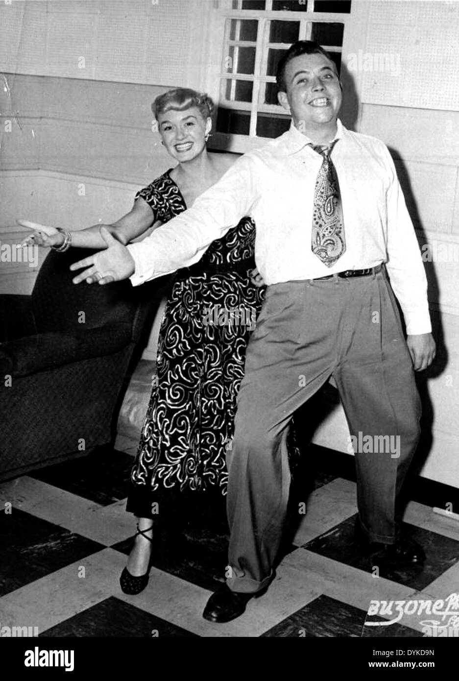 Jazz singer June Christy clowning with DJ Rick Hollister Stock Photo
