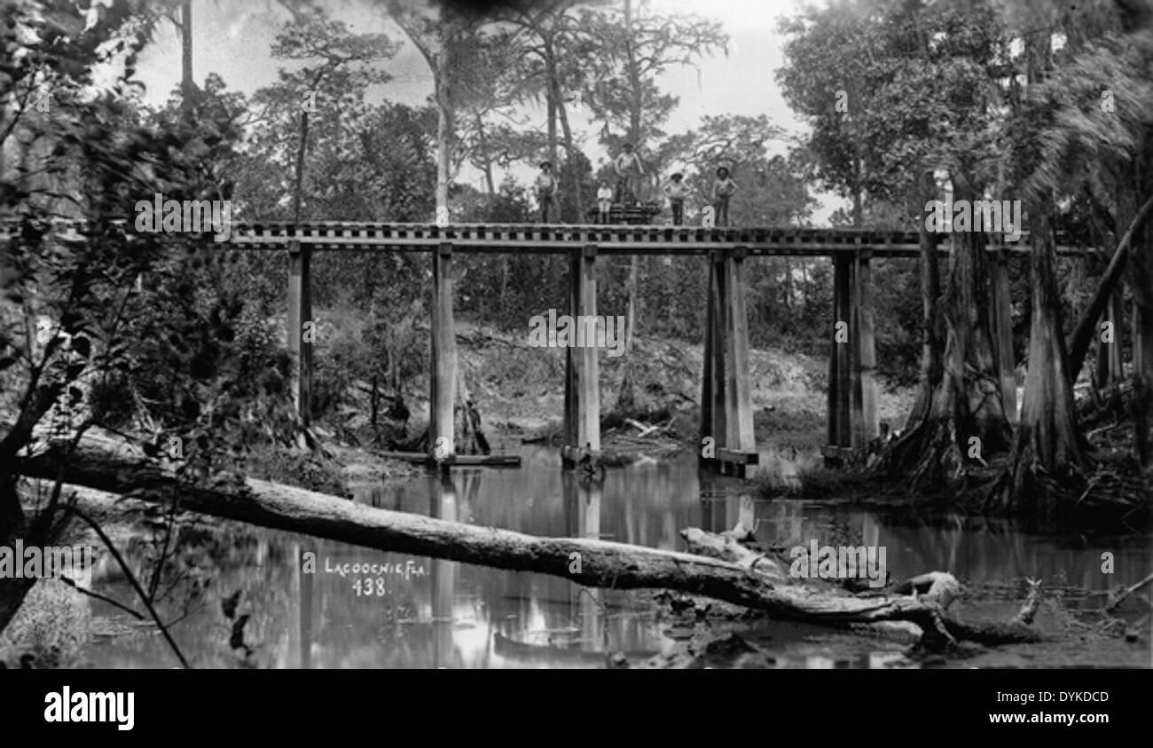 Railroad workers on a bridge - Lacoochee, Florida Stock Photo