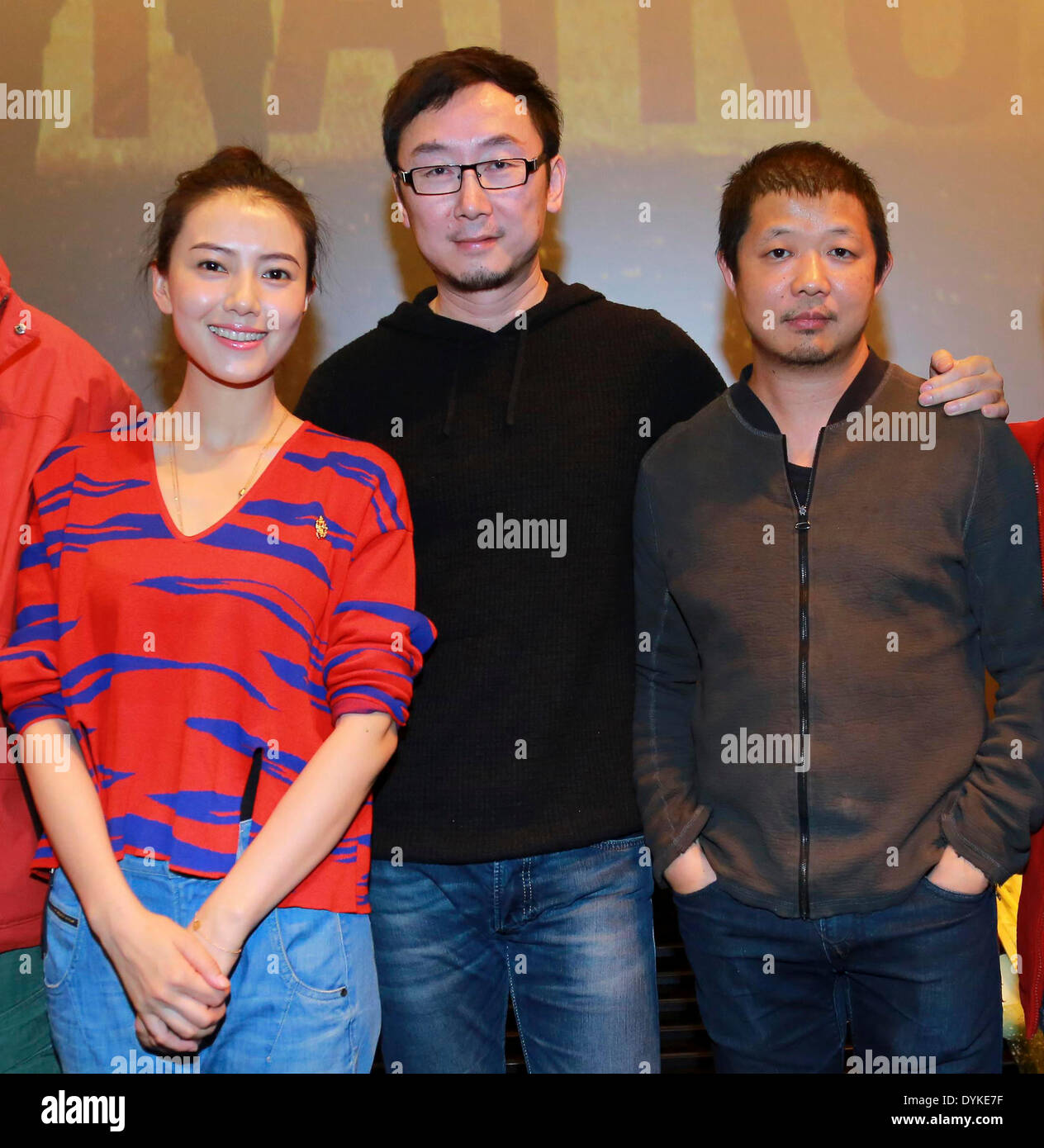 Beijing, China. 21st Apr, 2014. Actress Gao Yuanyuan (L), director Lu Chuan(C) and photographer Cao Yu pose for photos at the 10th anniversary activity of film 'Mountain Patrol' in Beijing, capital of China, April 20, 2014. Film 'Mountain Patrol', directed by Lu Chuan, was screened in China on Oct. 1, 2004. © Xinhua/Alamy Live News Stock Photo