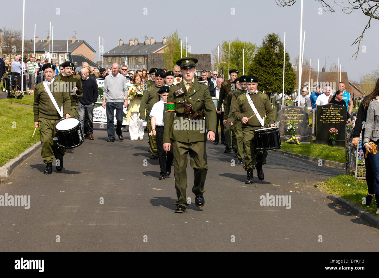 Derry, Londonderry, Northern Ireland. 21st April, 2014. Dissident Republicans Commemorate Easter Rising. A republican band dressed in paramilitary uniforms attends the dissident Irish republican 32 County Sovereignty Movement parade to the City Cemetery in Derry to commemorate the 1916 Easter Rising. Credit: George Sweeney / Alamy Live News Stock Photo
