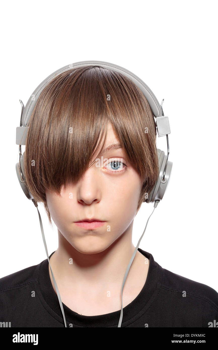 teenager boy with hair over one eye and headphones, isolated on white