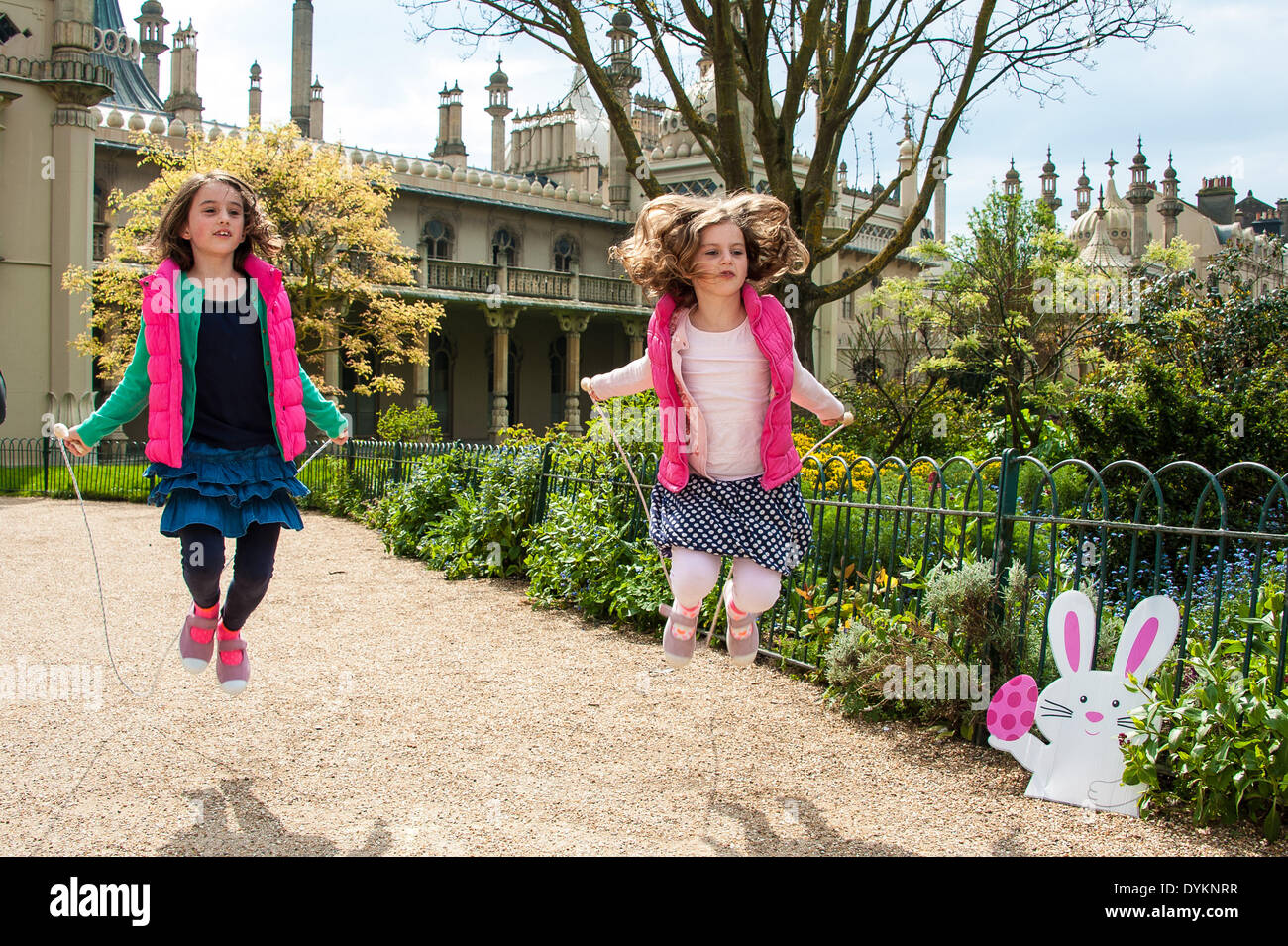 Brighton, UK. 21st Apr, 2014. Molly and Kitty Sharp skip for Easter eggs as Brighton & Hove Food and Drink Festival hold the Easter Egg hunt in aid of the children's charity Rockinghorse in Pavilion Gardens, Brighton. Children complete games to find Easter eggs around the Brighton Pavilion gardens: egg and spoon race, skipping, quoits and card games before making a badge and receiving a medal for their efforts. The event is sponsored by PHS Group PLC and raises over £400 for the Rockinghorse charity.  Credit:  Julia Claxton/Alamy Live News Stock Photo