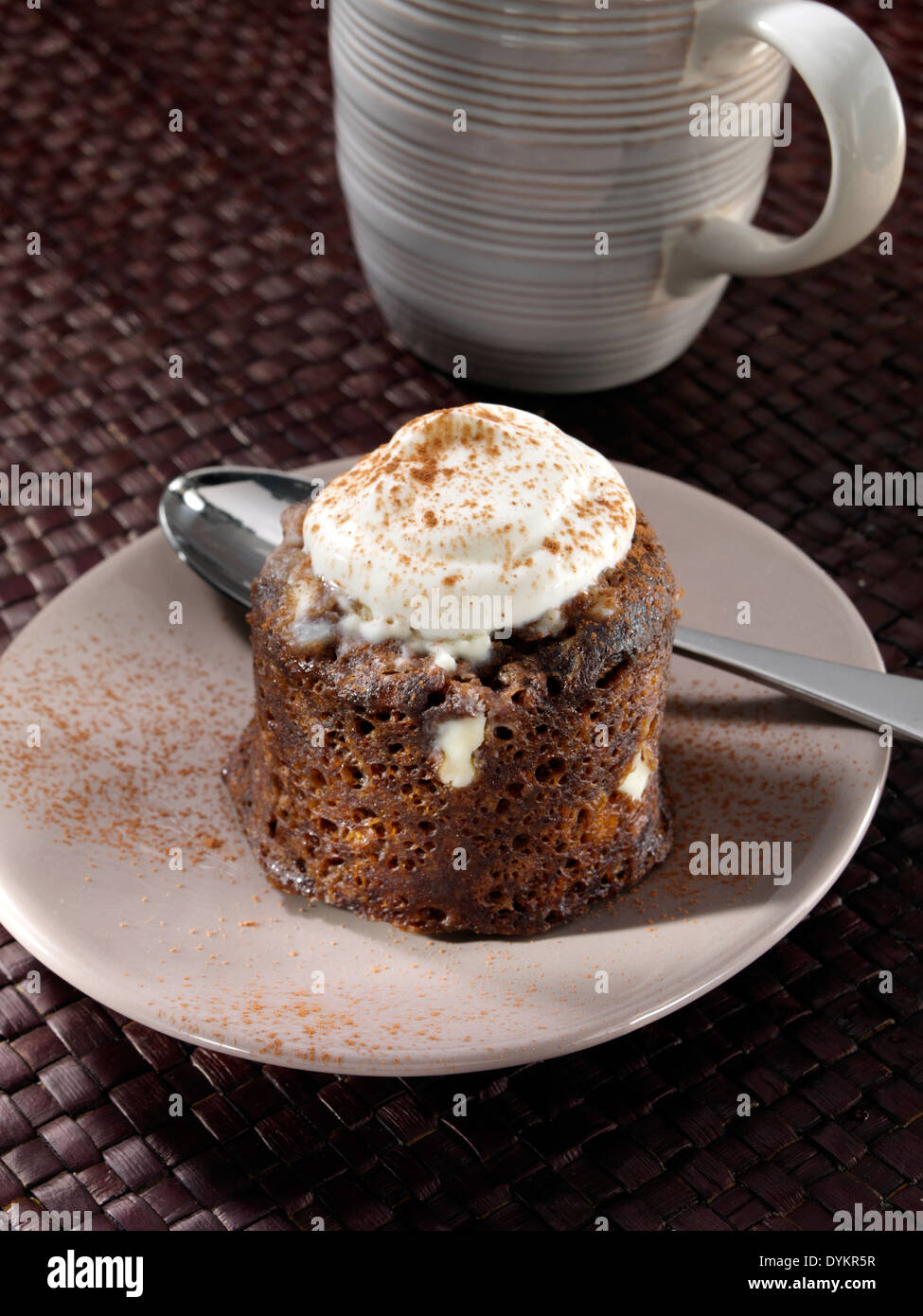 Microwaved chocolate pudding in a mug Stock Photo Alamy