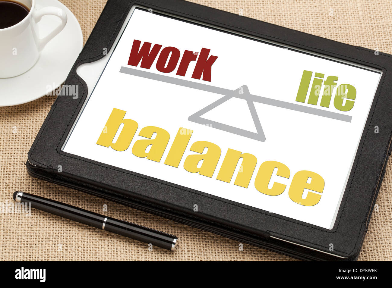 work life balance concept on a digital tablet with a cup of coffee ...