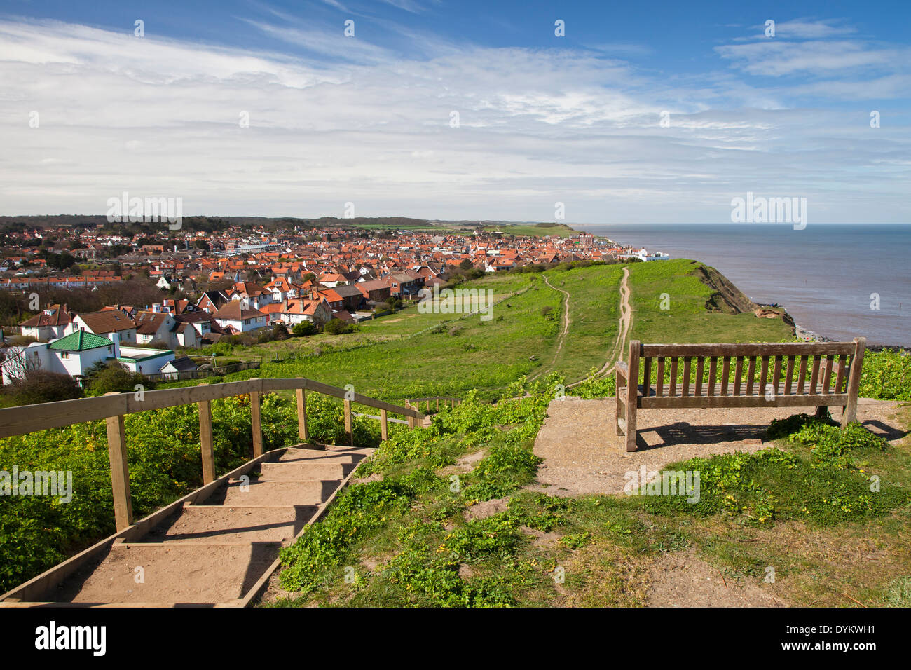 One of Sheringham's clifftop footpaths and distant view of town's golf course Stock Photo
