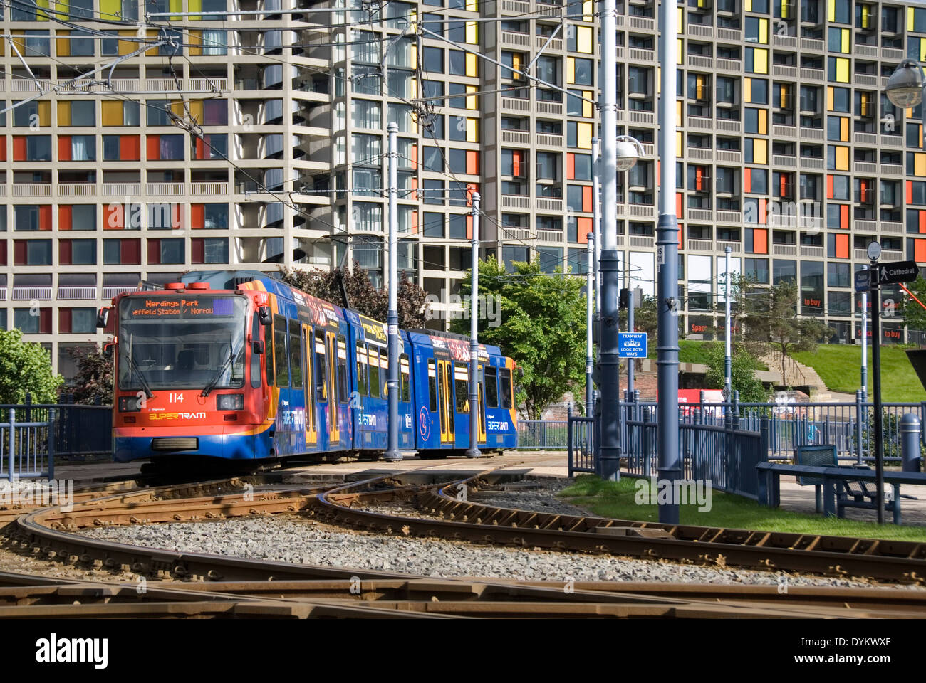 Park Square, Sheffield, UK, 22 June 2013 : Tram on supertram tram tracks and refurbished Park Hill flats Stock Photo