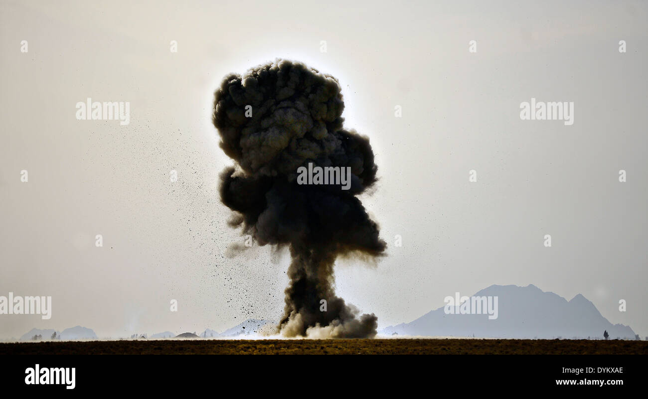 US Air Force explosive ordnance disposal technicians detonate four 500-pound bombs March 16, 2014 at Kandahar Airfield, Kandahar province, Afghanistan. Stock Photo