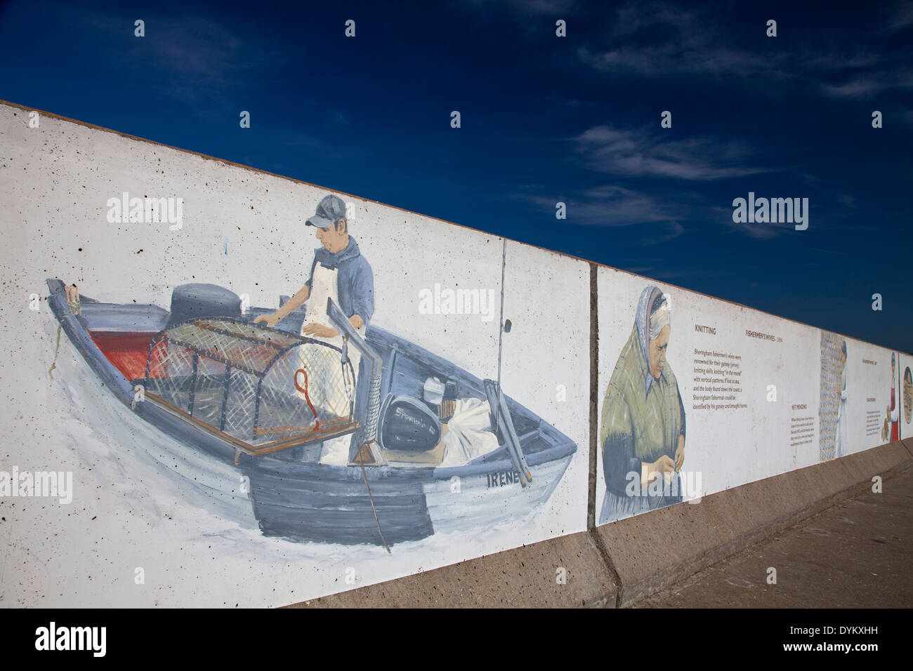 Sheringham's rich maritime history is celebrated in a mural on the North Norfolk town's promenade Stock Photo