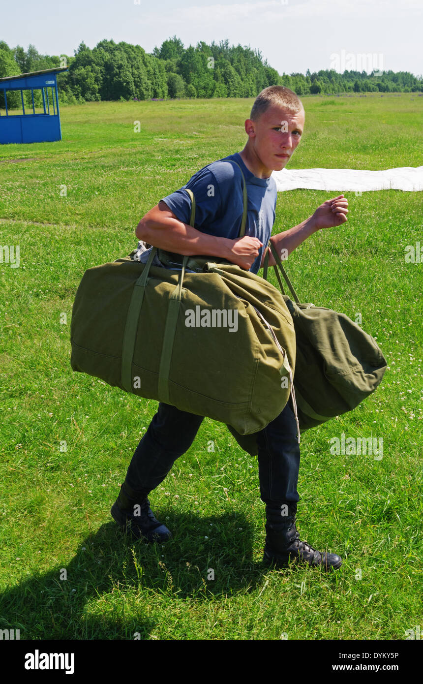 One day with parachutist in airfield. Preparation for parachute