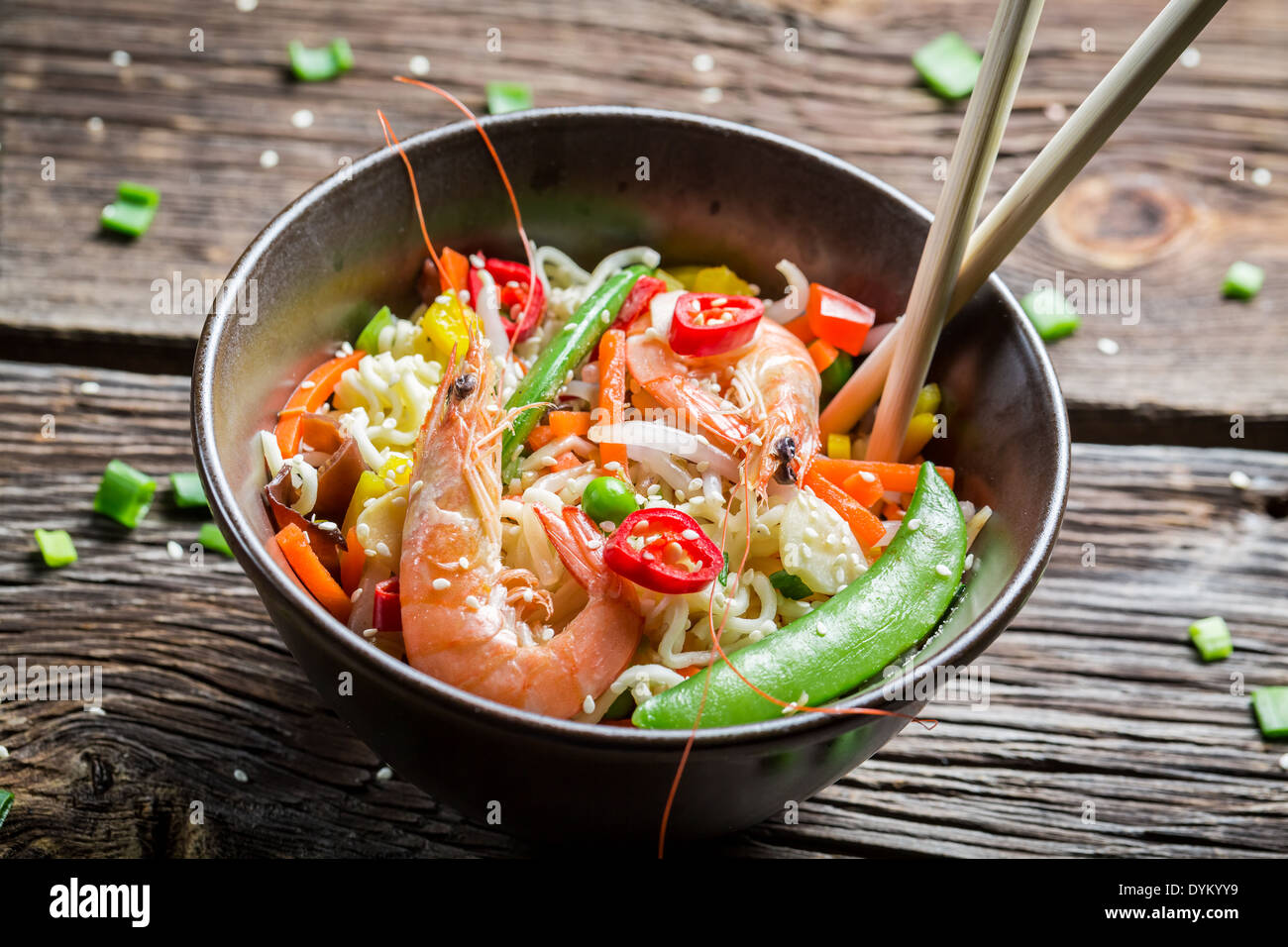 Shrimp with vegetables and noodles Stock Photo - Alamy