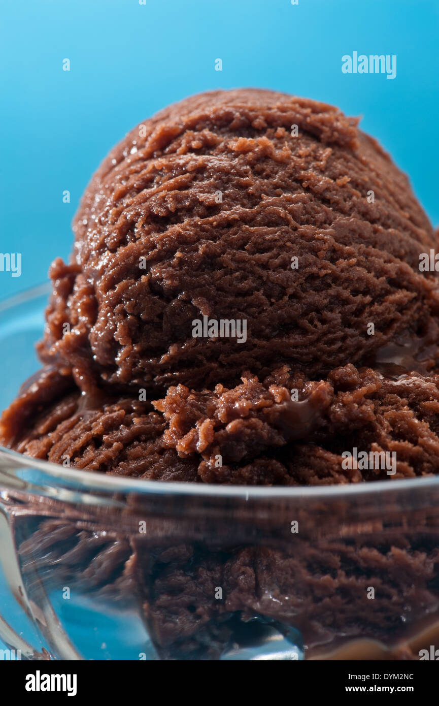 chocolate ice cream over a blue background Stock Photo - Alamy