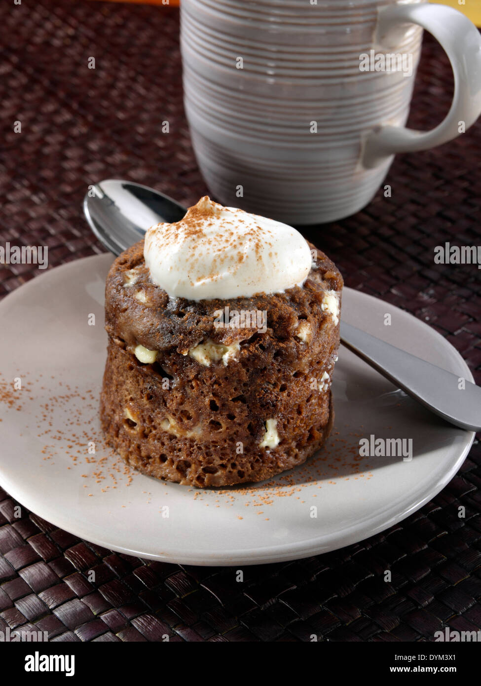 Microwaved chocolate pudding in a mug Stock Photo Alamy