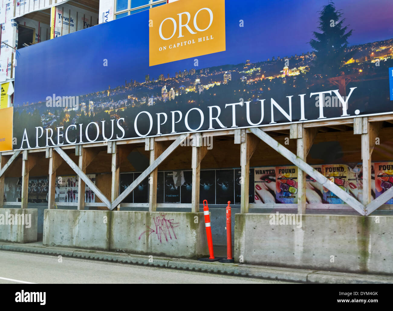 Sign on a new condo development in Greater Vancouver offering a 'Precious Opportunity'. Apartment building under construction. Stock Photo