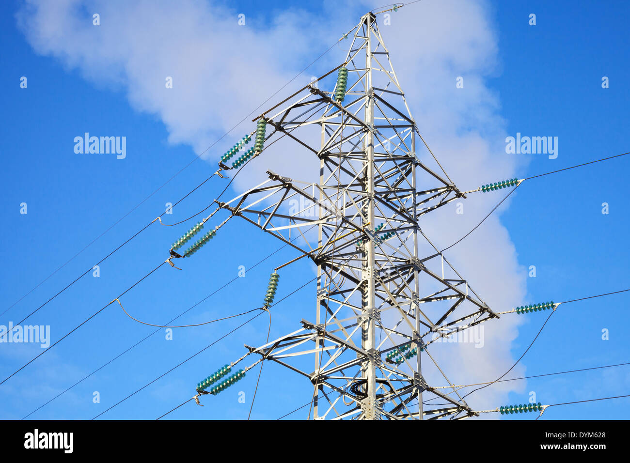 High voltage power lines and steel pylon above the sky Stock Photo