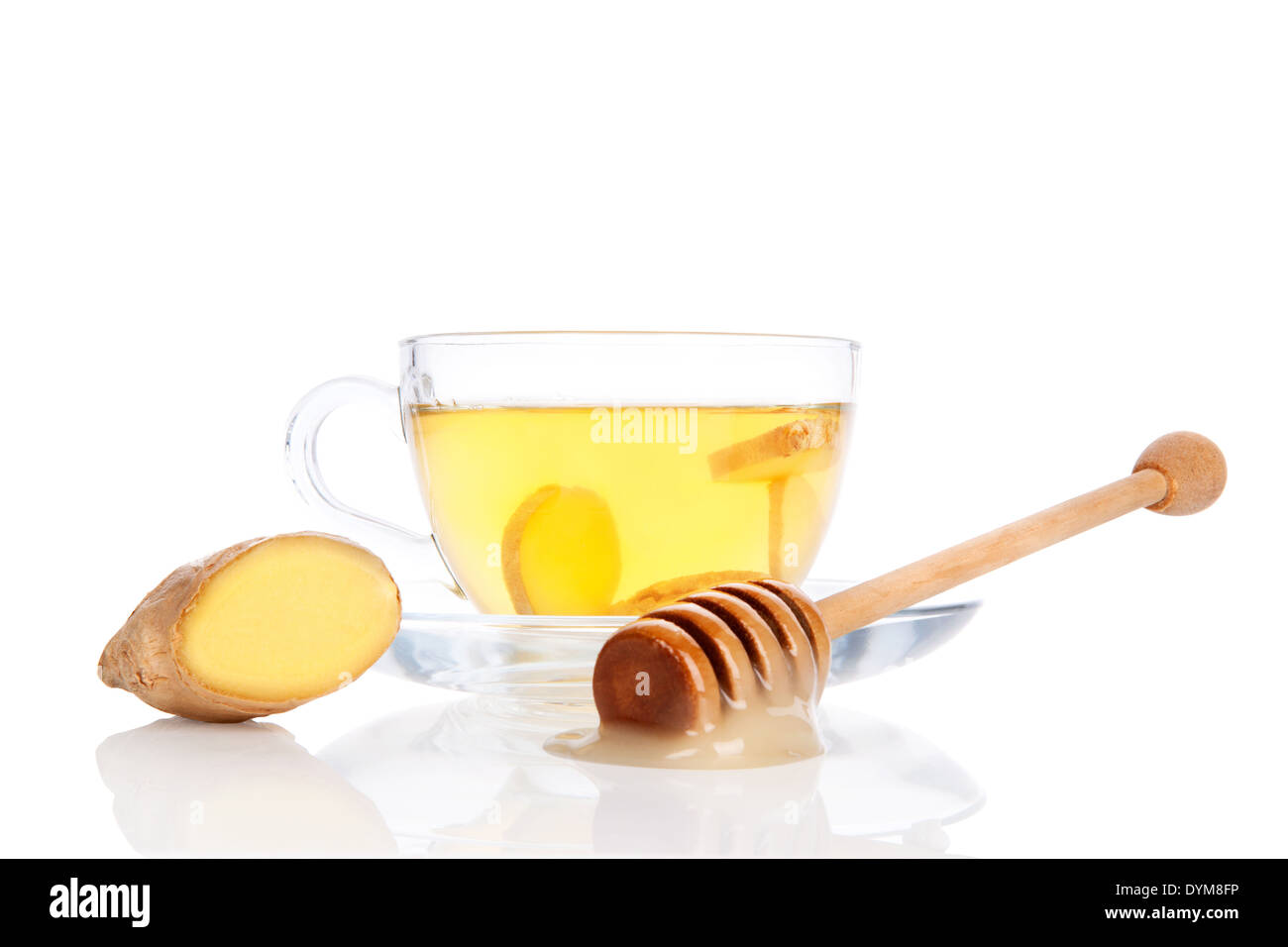 Cup of fresh ginger tea with ginger slices in transparent tea cup with ...