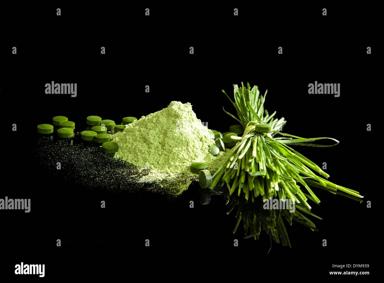 Healthy green supplements. Spirulina, wheatgrass, young barely, chlorella sa ground, green pills