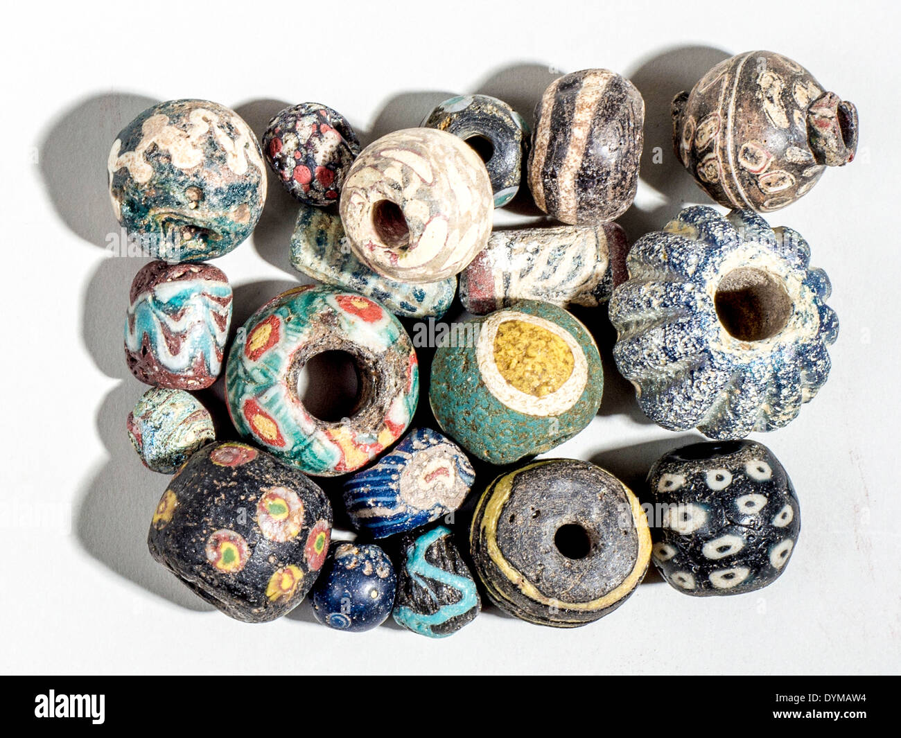 Islamic Glass Beads. 10Th century CE. On White Background Stock Photo