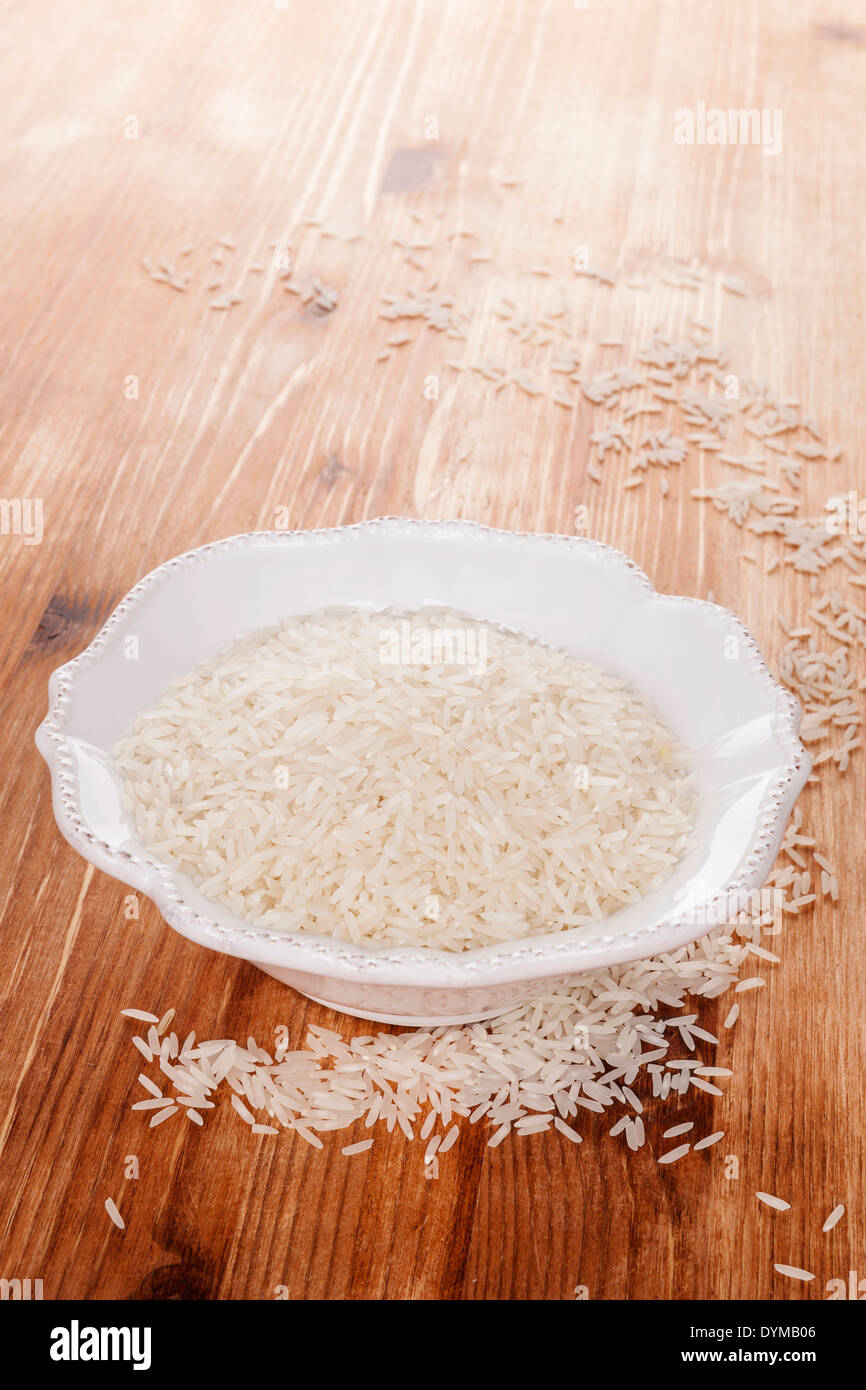 Traditional Asian Rice Eating Raw Rice In White Bowl In Brown Wooden Background Culinary Healthy Rice Eating Stock Photo Alamy
