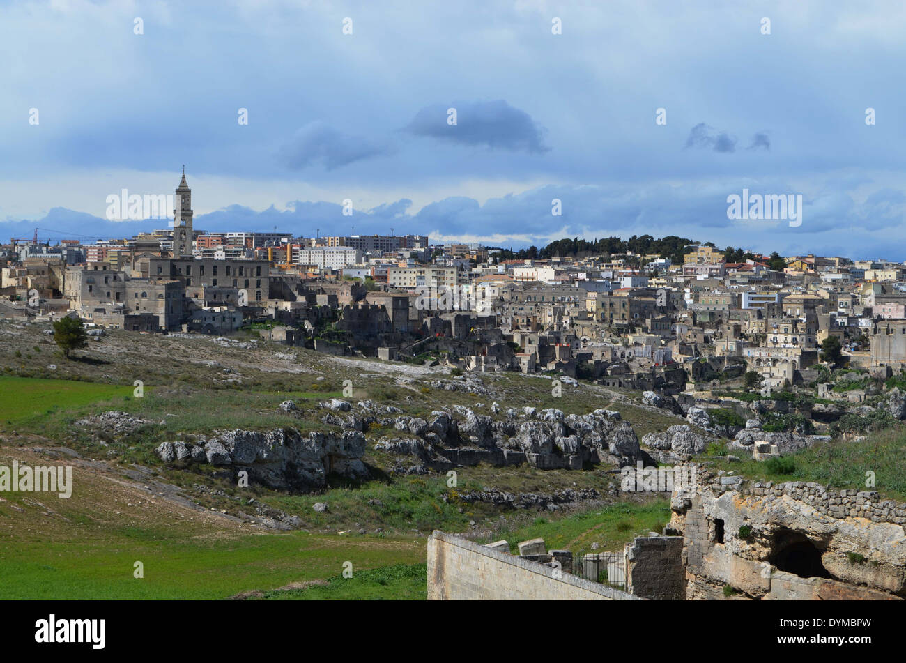 Matera,from a distance.One of firsthuman settlement in ItalyThe people, 'the sassi' were troglydyte(pre-historic) lived in caves Stock Photo