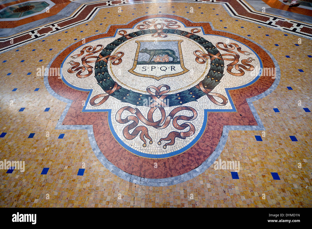 Ground mosaic from marble town coat of arms from Rome S.P.Q.R luxury-shopping passage roofed gallery Galleria Vittorio Emanuele Stock Photo